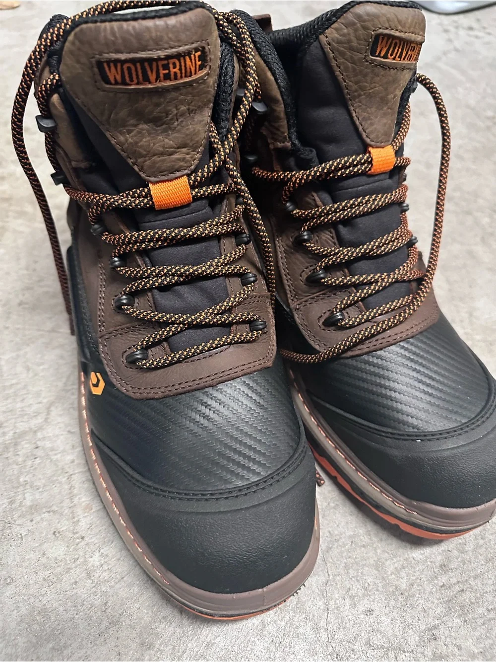 Wolverine Black and Brown Steel toe Work Boots with Orange Accents